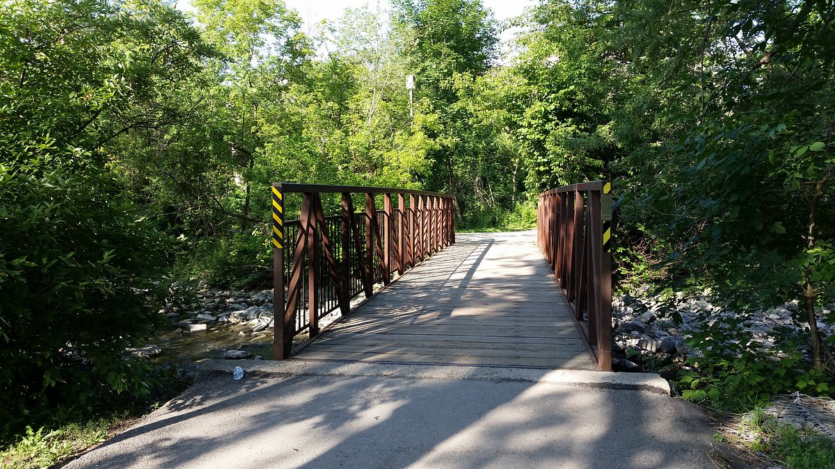 Peaceful walking path along the winding river